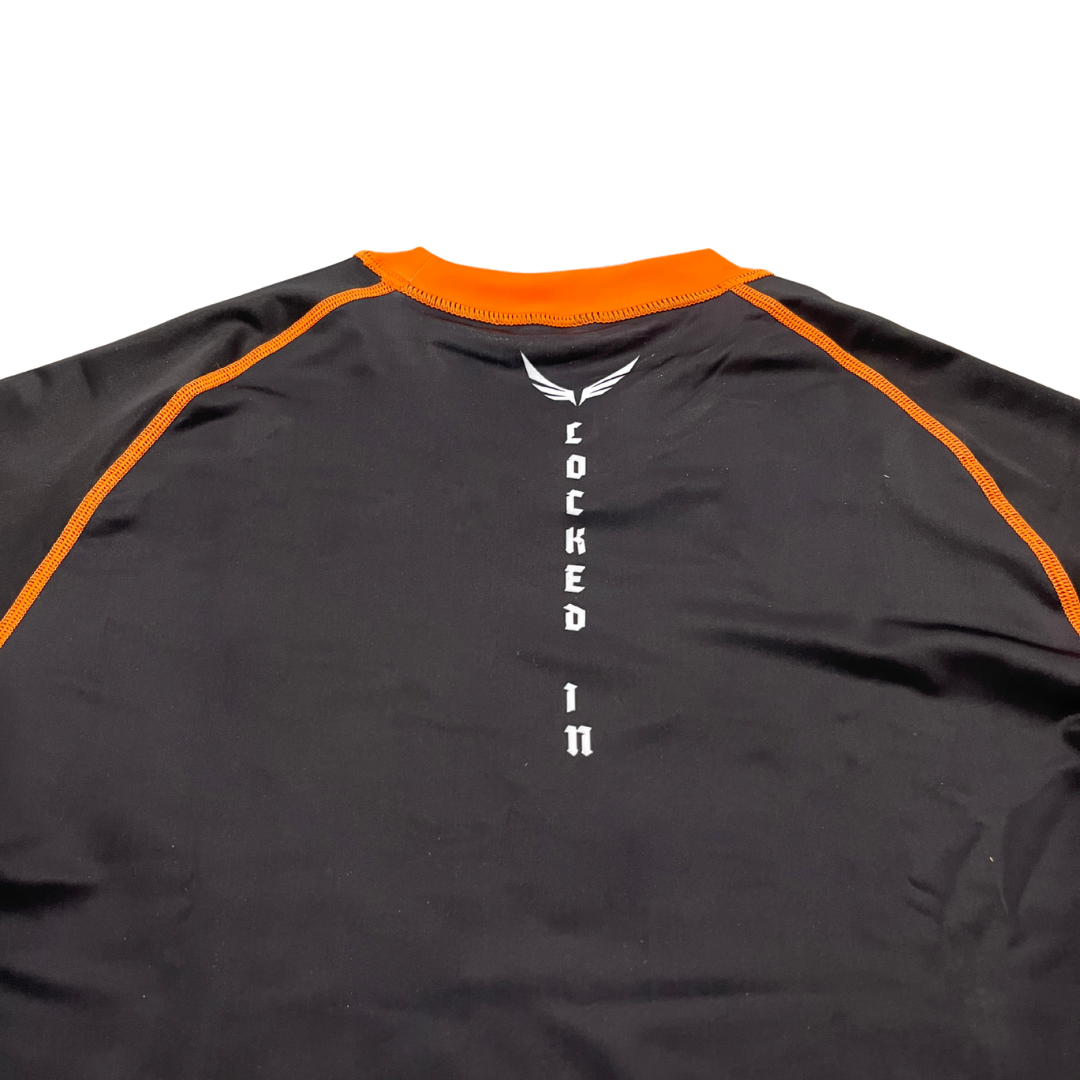R09. Rashguard short sleeve - Orange/Black